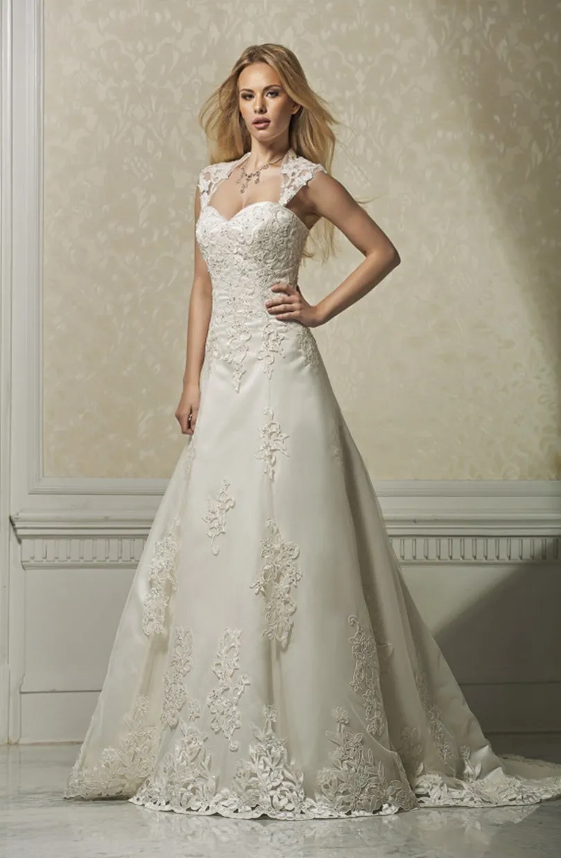 ---Catalog 2021 wedding dress made in satin and tulle with lace inserts decorated with sparkling stones--