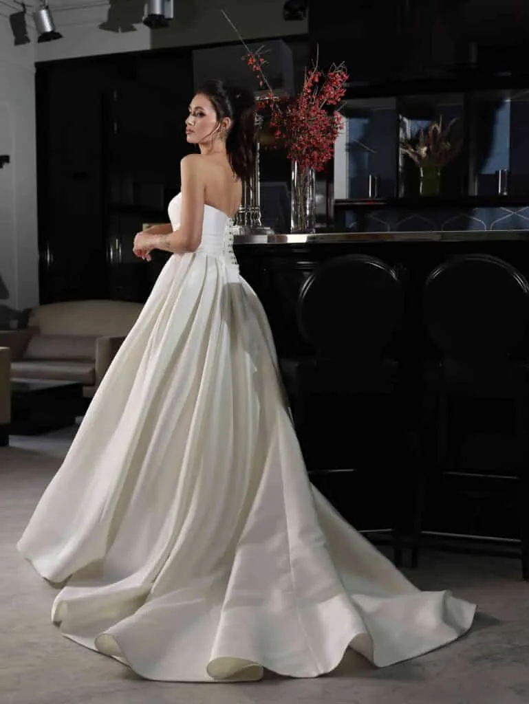 ---Mikado wedding dress, elegant V-neck bodice, defined by an A-line skirt, zip and button closure, chapel train--